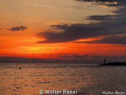 The sea and the fisherman by Walter Bassi 